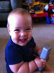 He's still young enough to accept the toy remote...occasionally!