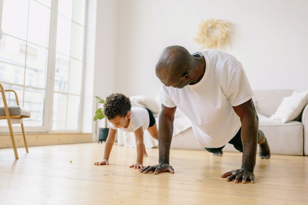 father and son working out how to help son with body image Christian